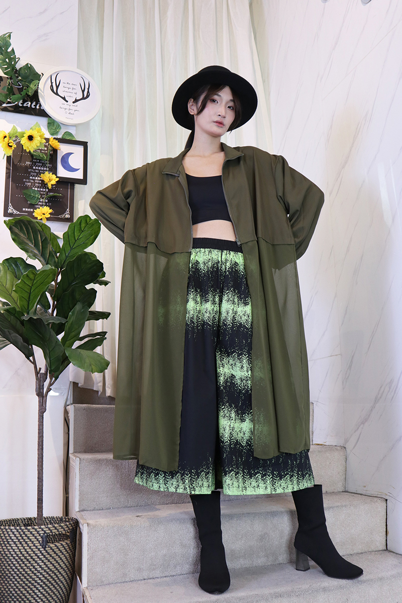 綠黑撞色藝術渲染8分造型裙褲