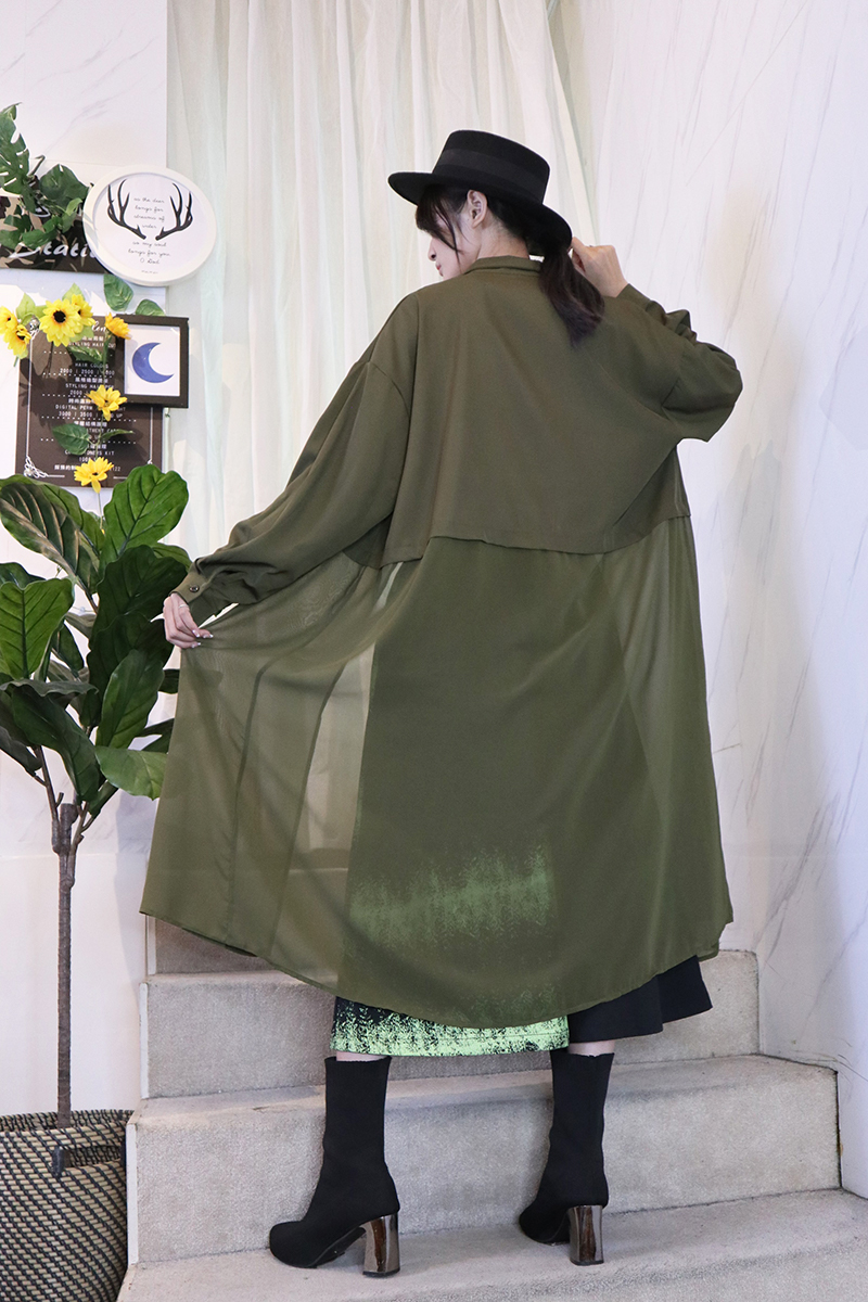 綠黑撞色藝術渲染8分造型裙褲